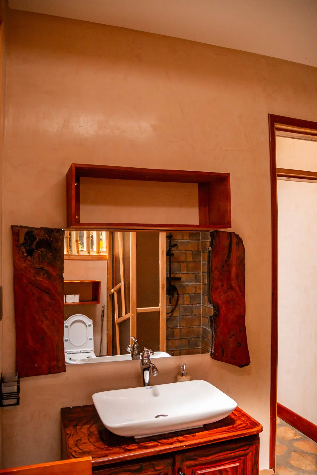 Guest bathroom with a timber vanity, basin and walk-in shower